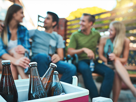 friends enjoying beers on a patio