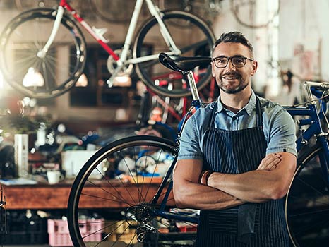 a business owner in a bicycle shop